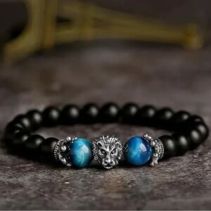 Black and Blue Beaded Bracelet with Lion Charm